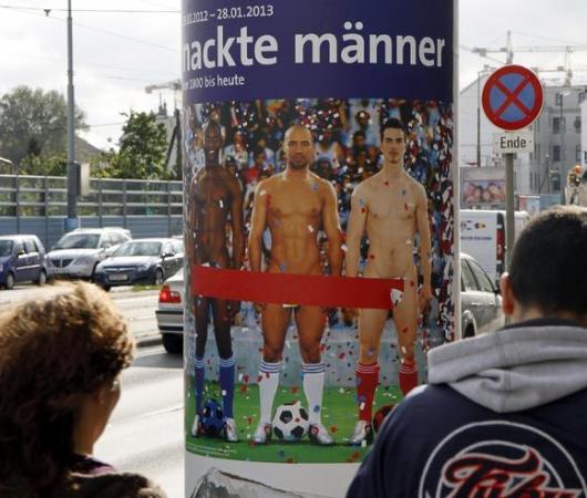 A poster in Vienna advertising for the exhibition that has already been covered (Ronald Zak / Associated Press)